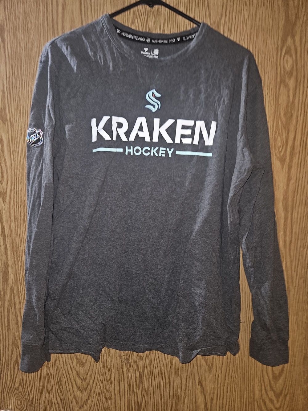 Kraken Hockey Long-Sleeve Tee - Dark Gray with Teal Logo